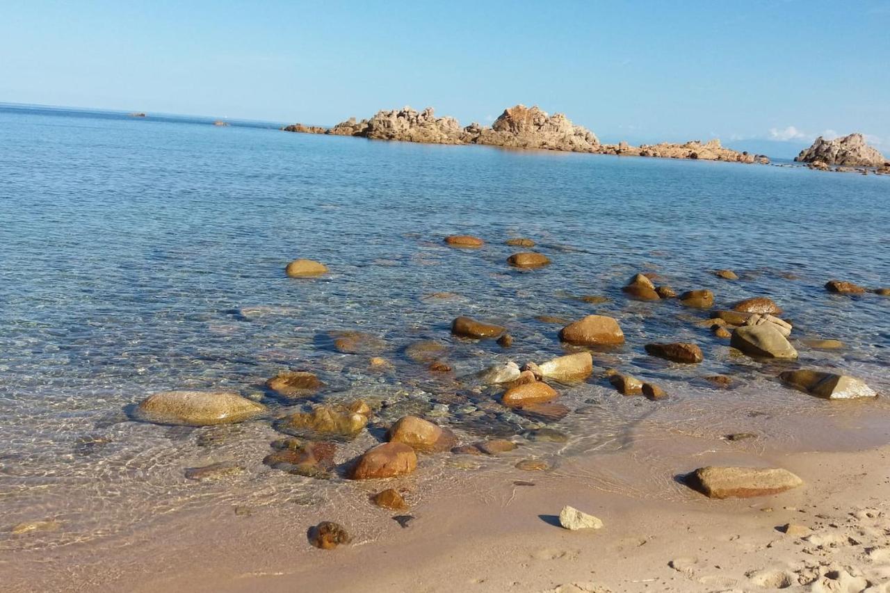 un angolo di Paradiso a pochi passi dal mare nel villaggio Calarossa Isola Rossa Esterno foto